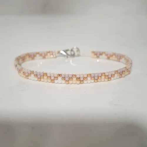 Pulsera fina rosa pastel